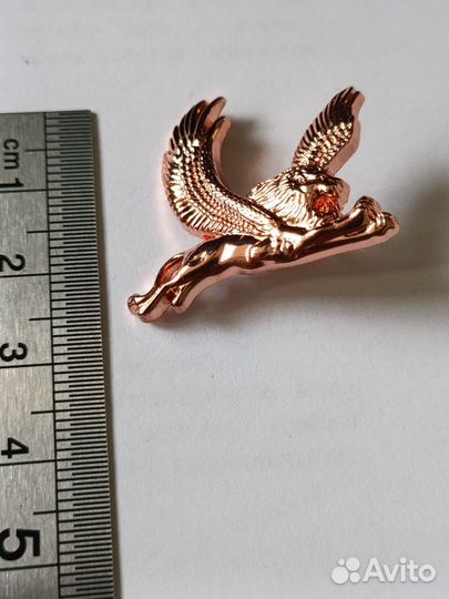 Значки грифон