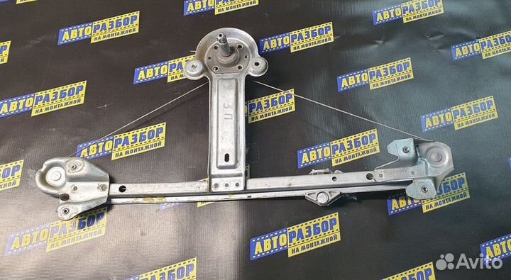 Стеклоподъемник механ. задний правый Opel Astra