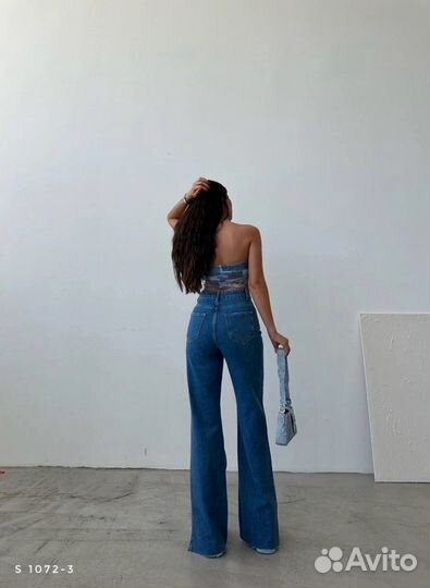 Джинсы женские широкие с разрезами по краям
