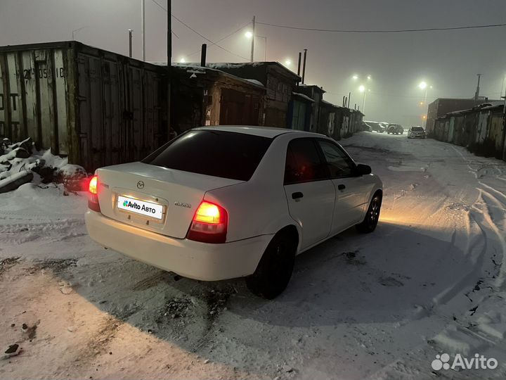 Mazda Familia 1.3 AT, 1999, 200 000 км