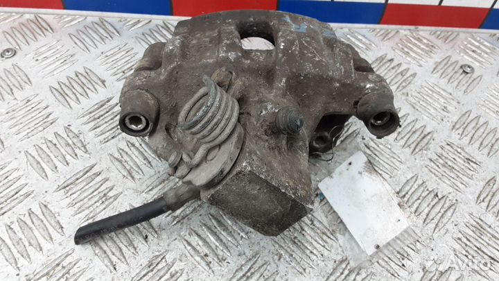 Суппорт тормозной задний правый на Ford Focus 2