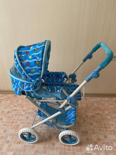 Большая игрушечная коляска для кукол