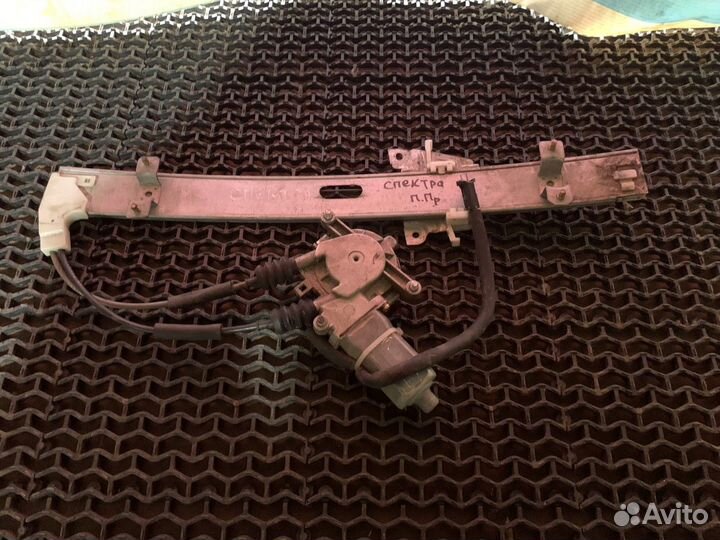 Стеклоподъемник передний правый Kia Spectra