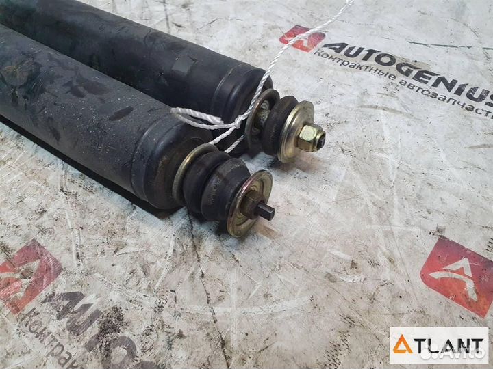 Амортизатор задний nissan lafesta