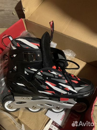 Роликовые коньки