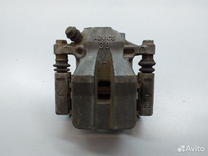 Суппорт тормозной задний левый Toyota Rav4 XA40