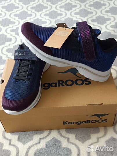 Кроссовки новые