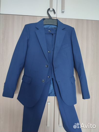 Школьная форма для мальчика 128 синяя. Цена 1000
