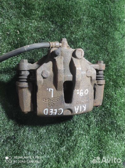 Передний левый суппорт Kia Ceed 2009