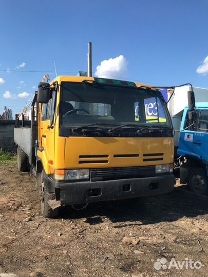 Продаем Nissan Diesel CW520 кранборт по запчастям