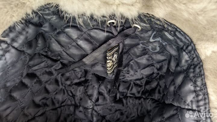 Женские меховые шапки