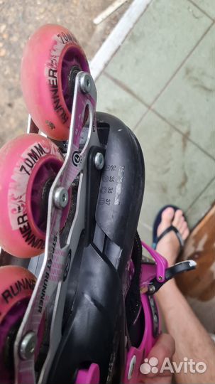 Роликовые коньки