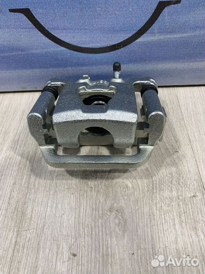 Суппорт тормозной задний Nissan qashqai J10 Прав