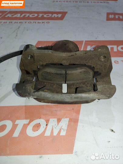 Суппорт тормозной передний левый Nissan X-Trail