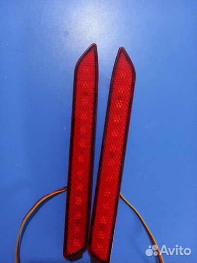 Отражатель бампера задний левый Toyota Camry