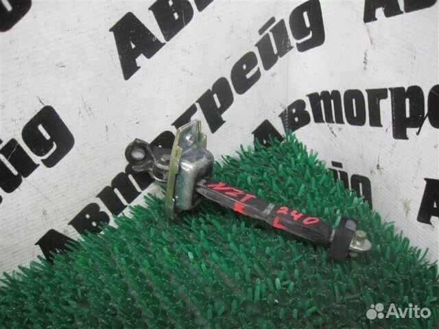 Ограничитель двери задний левый Toyota Allion