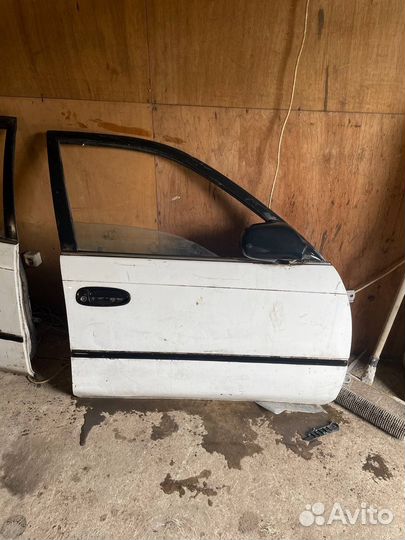 Дверь toyota corolla LX AE100