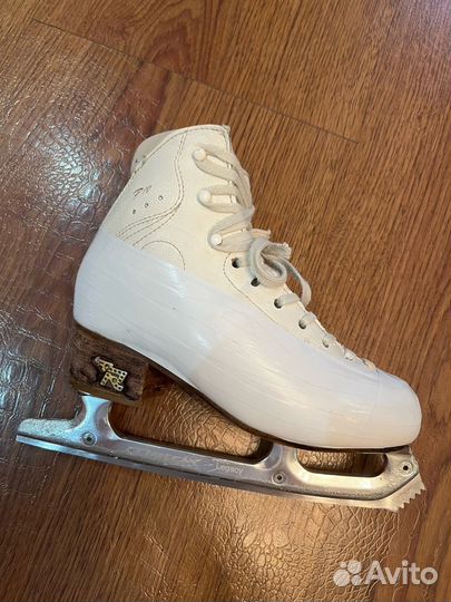 Продам профессиональные фигурные коньки