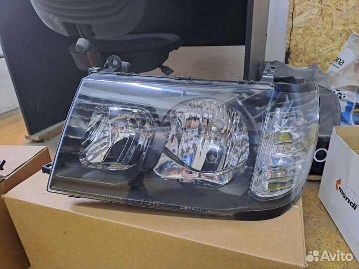 Фара передняя Toyota Land Cruiser 100