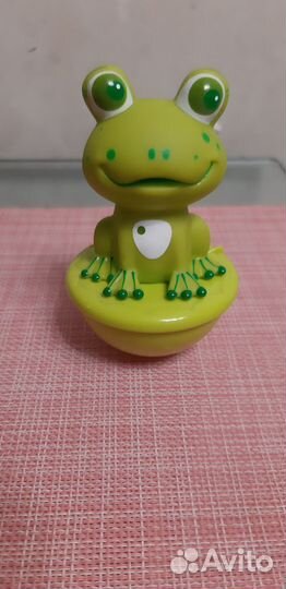 Игрушка лягушка