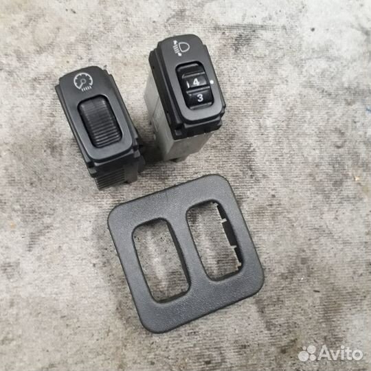 Кнопка корректора фар Мицубиси Лансер 9