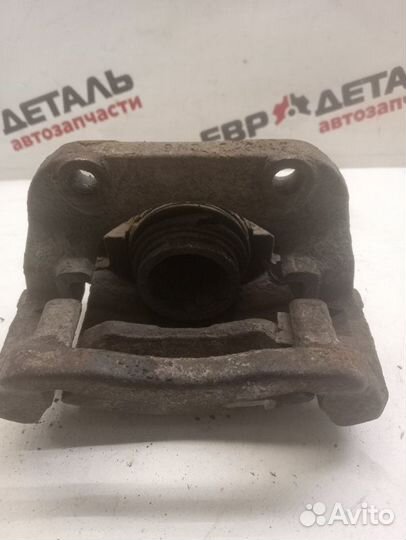 Суппорт тормозной передний правый Renault Logan