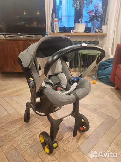 Коляска автокресло doona с базой isofix