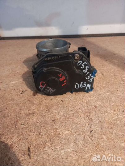 Дроссельная заслонка Пассат Б5 1.8т 058133063M