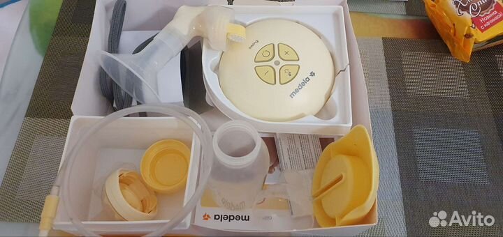 Молокоотсос medela электрический