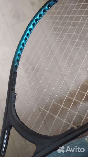 Теннисная ракетка