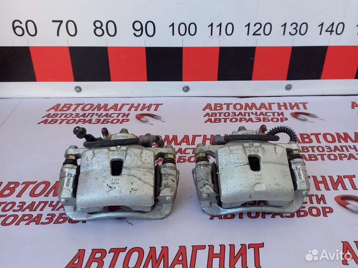 Супорт тормозной передний Киа Церато 4 BD 18-н.в