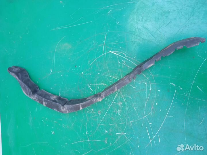 Кронштейн крепления заднего бампера Opel Astra H с