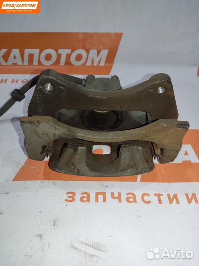 Суппорт тормозной передний левый Mitsubishi Lancer