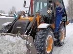 Чистка снега трактором