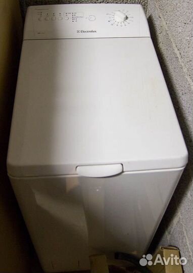 Стиральная машина Electrolux вертикальная