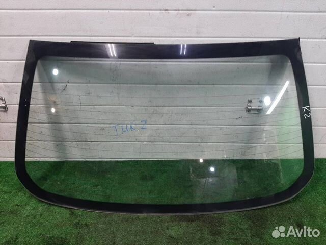 Стекло заднее Nissan Tiida 2008