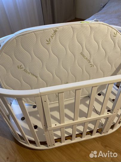 Детская кроватка трансформер с маятником