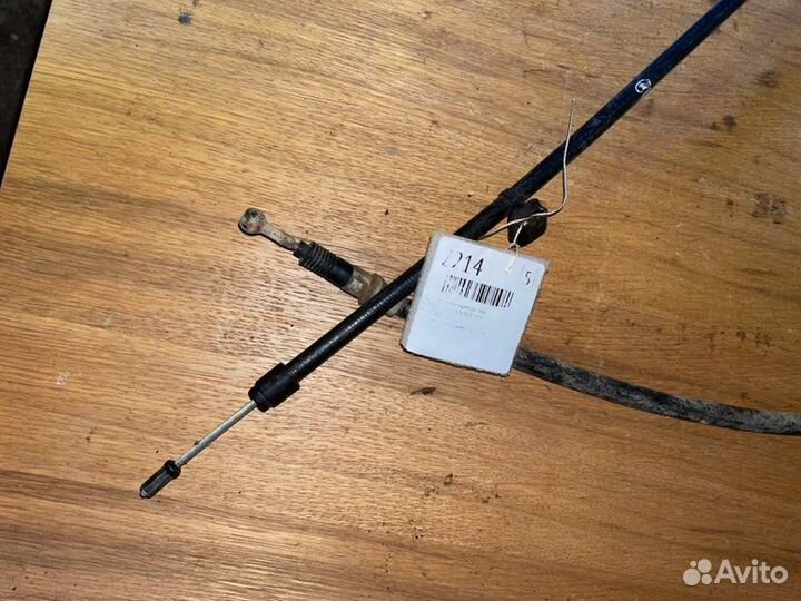 Трос ручного тормоза левый Opel Astra J A16XER