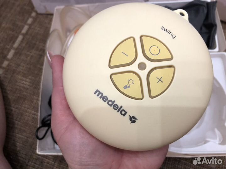 Молокоотсос medela электрический