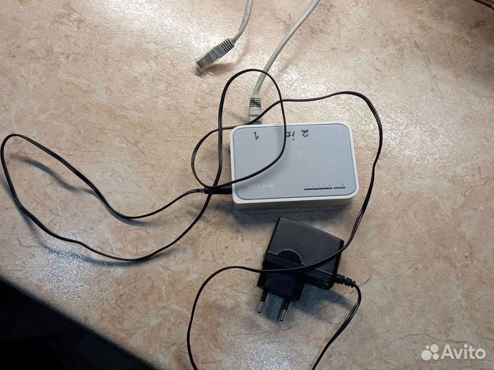 Настольный коммутатор Tp- Link на 5 слотов