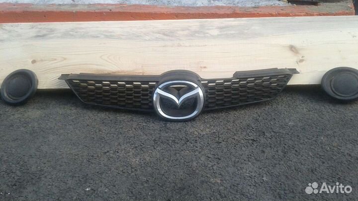Решетка радиатора мазда демио