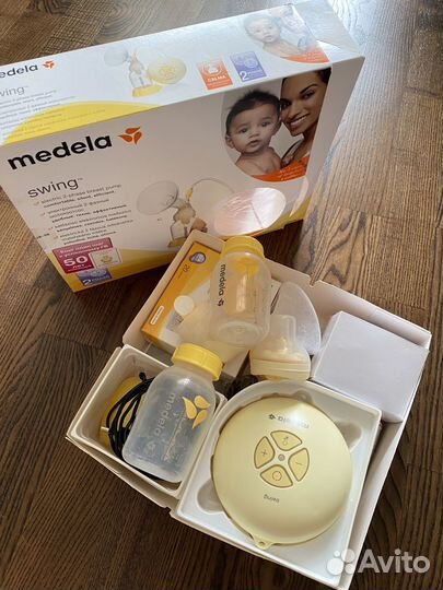 Молокоотсос medela swing электрический