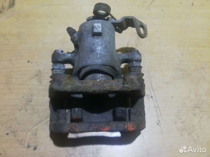 Суппорт задний правый opel zafira b