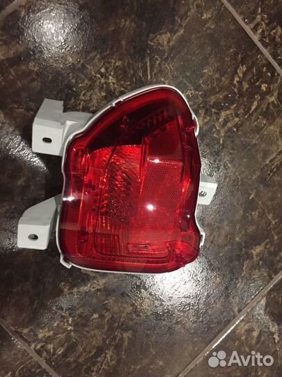 Фонарь новый в бампер RAV 4