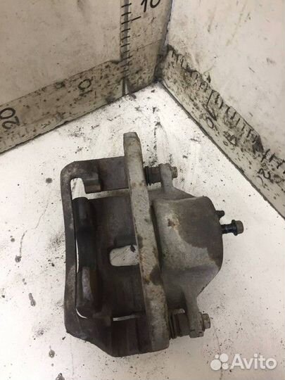 Суппорт передний левый Kia Sportage