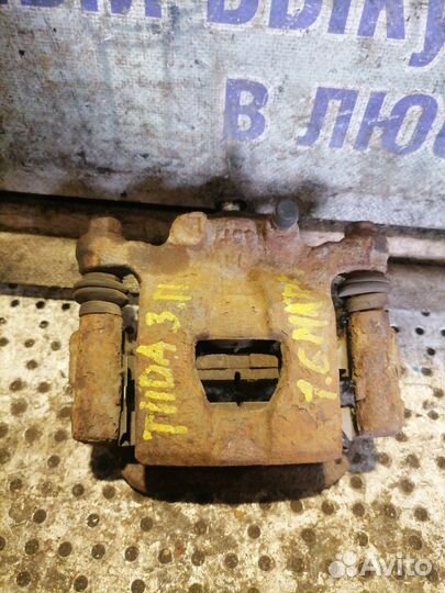 Суппорт тормозной задний правый Nissan Tiida