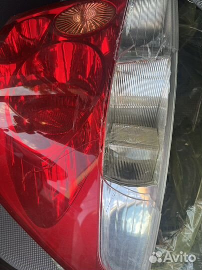 Фара левая задняя для Opel astra h битая