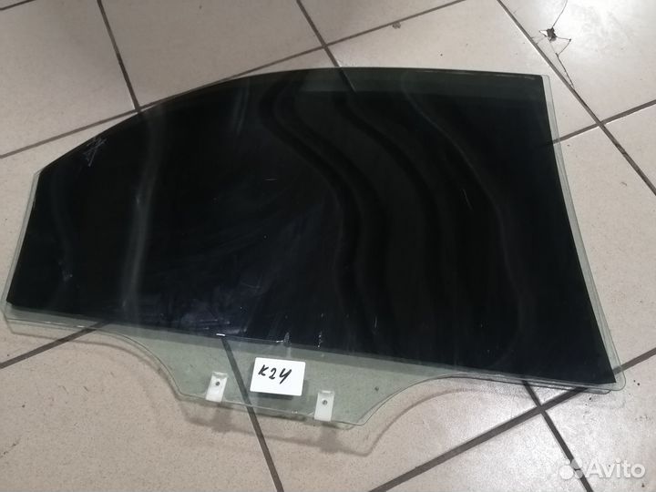 Стекло задней правой двери KIA spektra