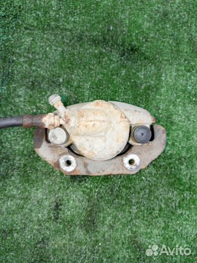 Суппорт тормозной передний левый Ford Fusion