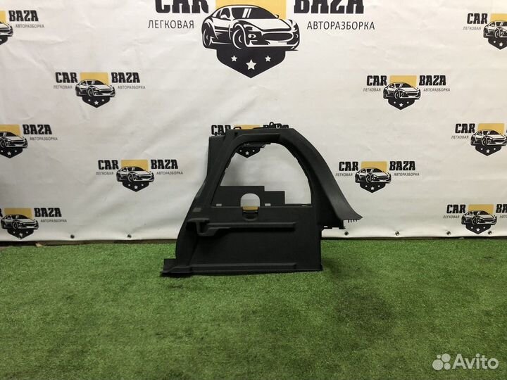 Обшивка багажника R Opel Corsa